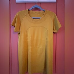 Lululemon Swiftly Tech Shirt Sleeve Top size 12. Goldenrod